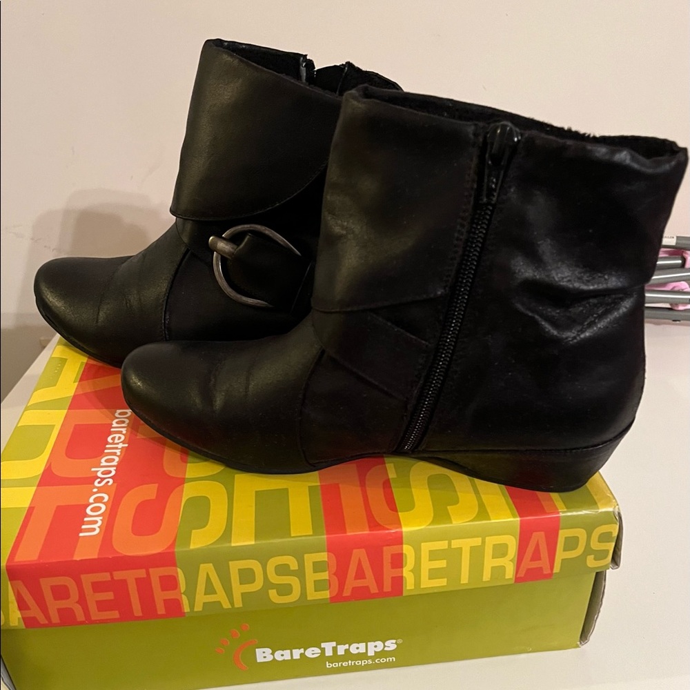 Bare traps black booties with a small heel.